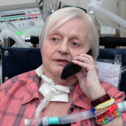 Speaking Valve Use During Mechanical Ventilation: More than Just for Communication and Swallowing Patient with PMV007 inline talking on a cellphone
